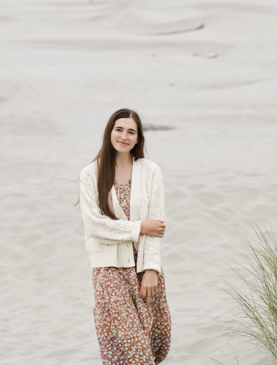 Anita smiling at the beach