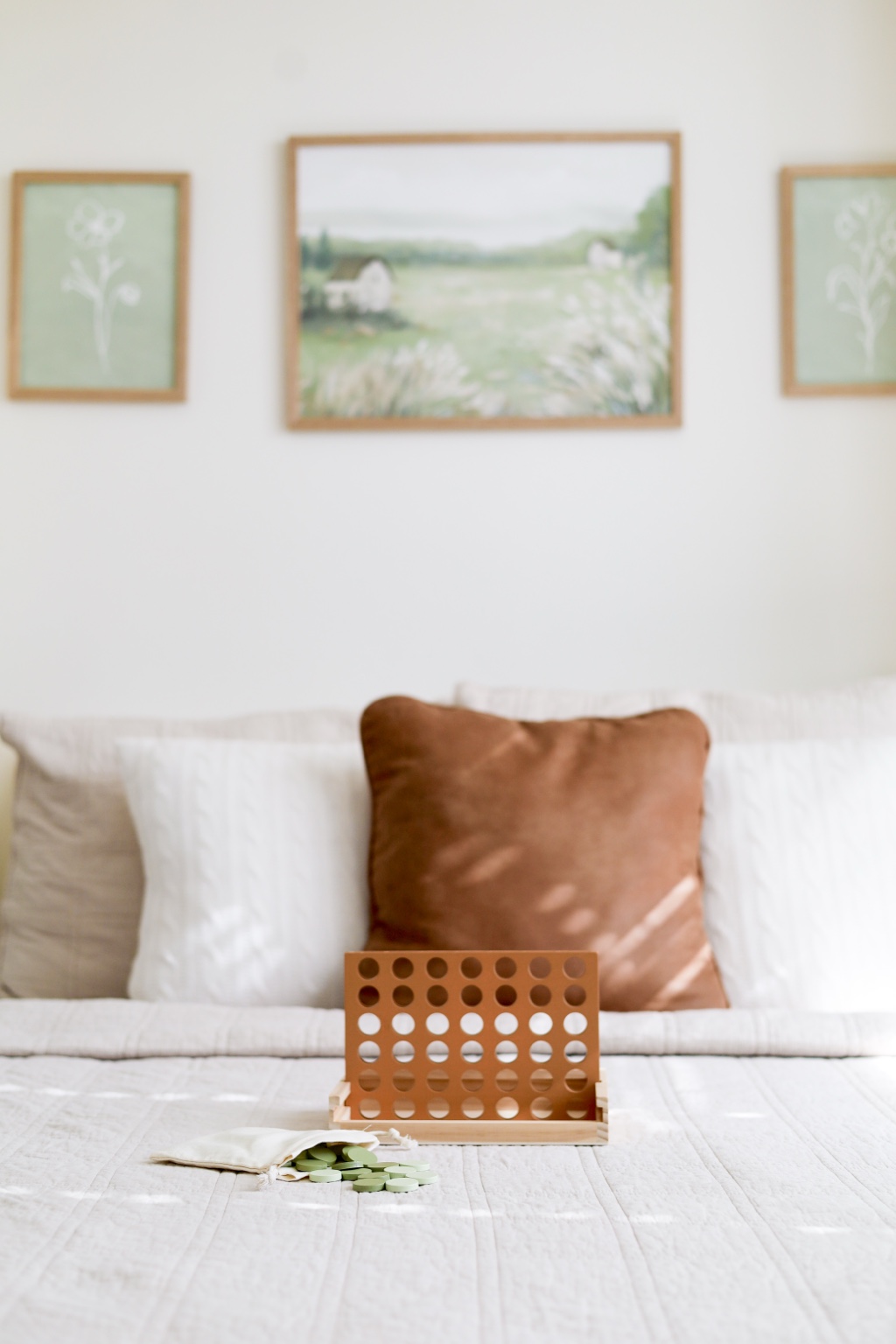 Wooden game styled on a bed