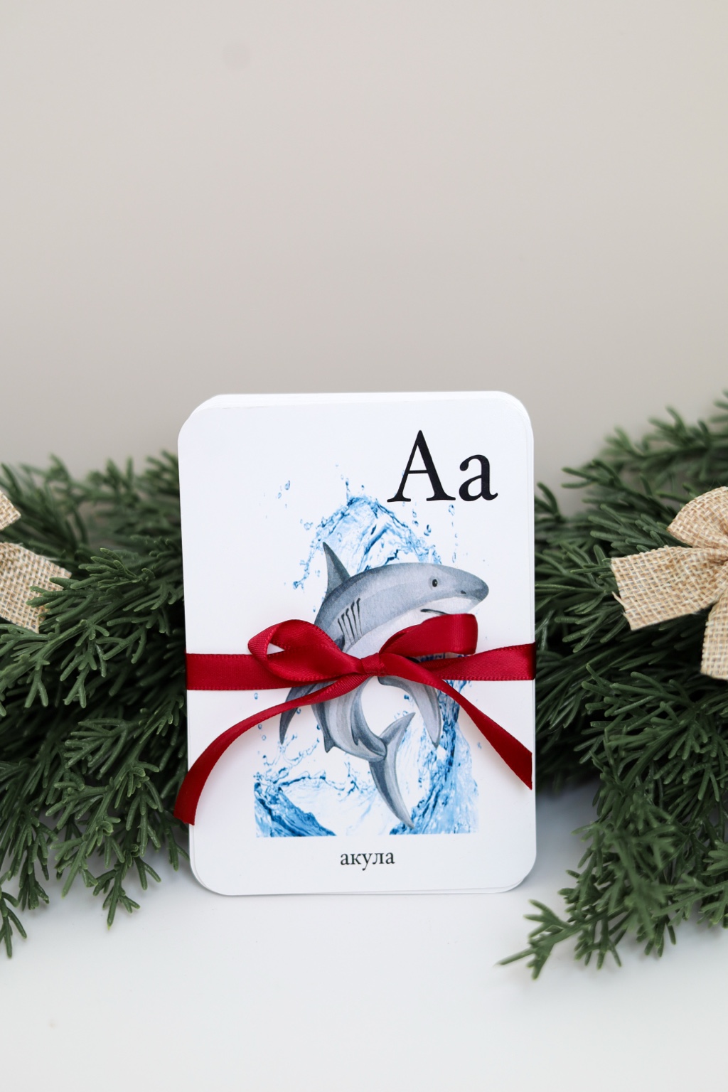 Illustrated alphabet cards tied with a ribbon