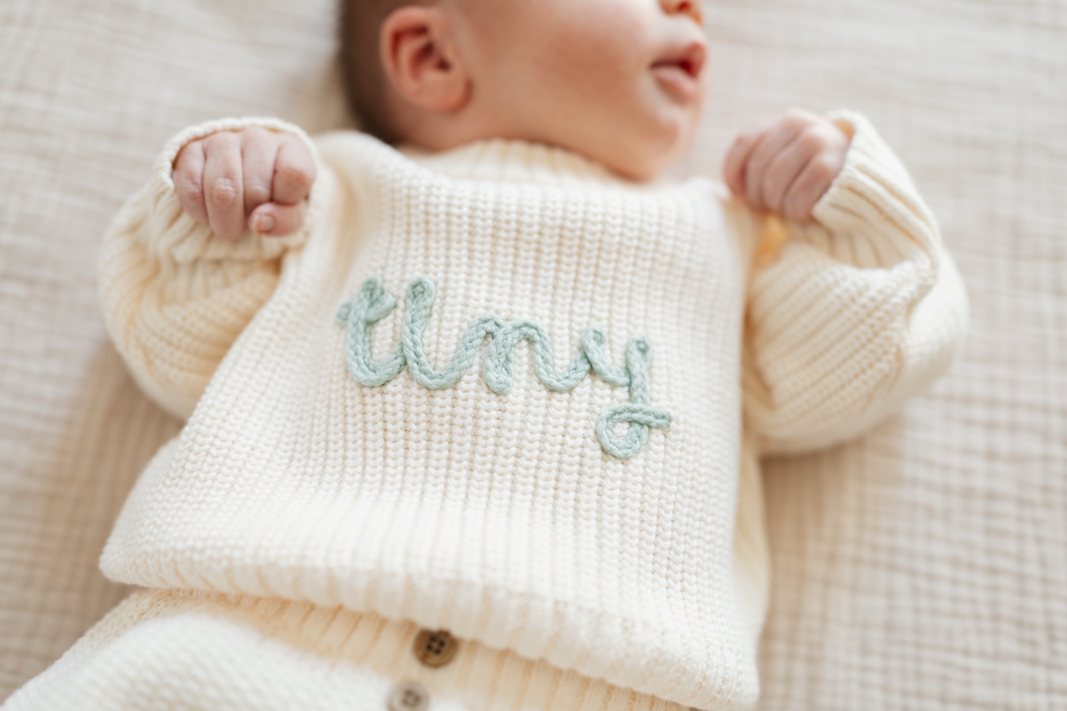 Baby wearing a handmade knit